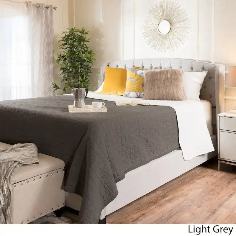 Struttura letto imbottita queen size con testiera in tessuto