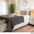 Struttura letto imbottita queen size con testiera in tessuto
