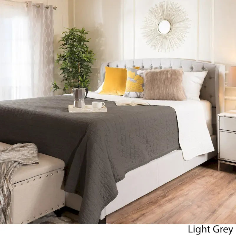 Struttura letto imbottita queen size con testiera in tessuto