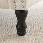 Poltroncina di design imbottita con borchie decorative
